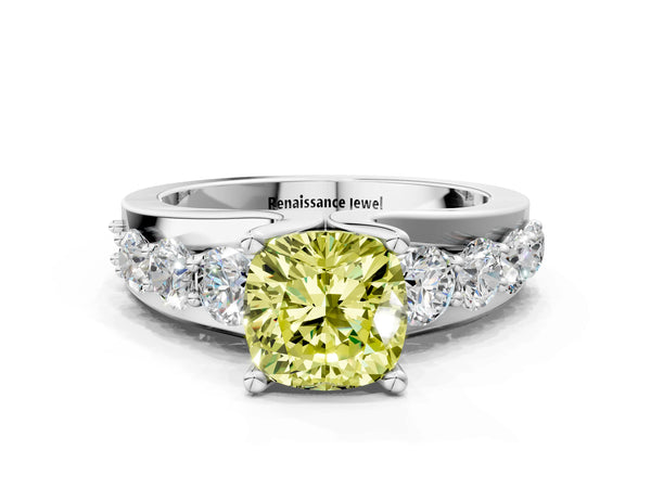 Platinum Fancy Yellow Cushion  Brilliant Solitaire with Side Stones on a Pave Band and Four-Prong Setting