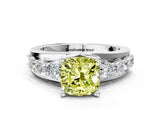 White gold Fancy Yellow Cushion  Brilliant Solitaire with Side Stones on a Pave Band and Four-Prong Setting_61