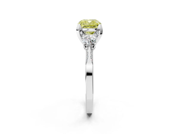 White gold Fancy Yellow Cushion Cut Brilliant Three-Stone Diamond Ring with Pavé Band and Four-Prong Setting