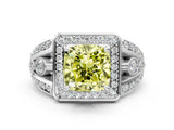 White gold Fancy Yellow Cushion Cut Diamond Halo Ring with Split Shank and Bezel Accents and Four-Prong Setting