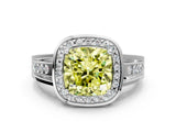 White gold Fancy Yellow Cushion Cut Diamond Halo Ring with Split Shank and Bezel Accents and Prong Setting