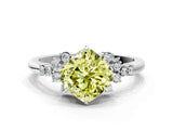 White gold Fancy Yellow Cushion Cut Diamond Ring with Side Stones and Four-Prong Setting_132