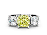 White gold Fancy Yellow Cushion Cut Diamond Three-Stone Ring with Channel Set Band and Four-Prong Setting_64