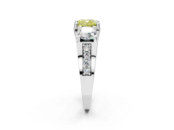 Platinum Fancy Yellow Cushion Cut Diamond Three-Stone Ring with Channel Set Band and Four-Prong Setting