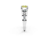 White gold Fancy Yellow Cushion Cut Diamond Three-Stone Ring with Channel Set Band and Four-Prong Setting_66