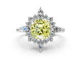 White gold Fancy Yellow Cushion Cut Halo Diamond Cluster Ring with Marquise and Round Stones on a White Gold Band with Prong Setting