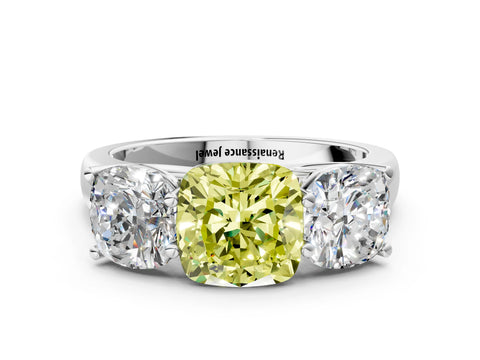White gold Fancy Yellow Cushion Cut Three-Stone Diamond Ring with Prong Setting on a Classic Band