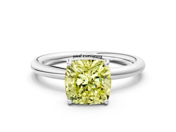 White gold Fancy Yellow Cushion  Solitaire Diamond Ring with Four-Prong Setting on a Plain Band