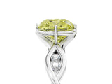 White gold Fancy Yellow Cushion  Solitaire Twist Band with Leaf Prong Setting