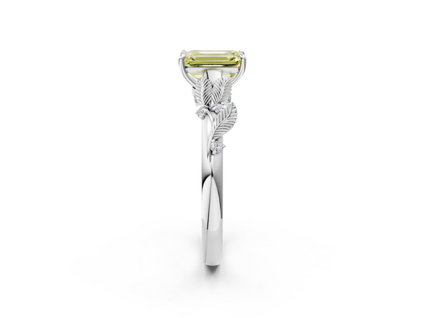 White gold Fancy Yellow Emerald Cut Diamond Solitaire Ring with Leaf Motif Band and Four-Prong Setting