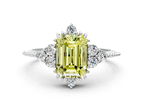 White gold Fancy Yellow Emerald Cut Brilliant Diamond with Cluster Setting on a Beaded Band and Four-Prong Setting