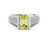 White gold Fancy Yellow Emerald Cut Cut Diamond Channel Set Pave Band with Tension Prong Setting
