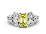 White gold Fancy Yellow Emerald  Cut Diamond Cluster Ring with Round Accent Stones and Prong Setting on a Classic Band_48