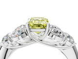 White gold Fancy Yellow Emerald  Cut Diamond Cluster Ring with Round Accent Stones and Prong Setting on a Classic Band_52