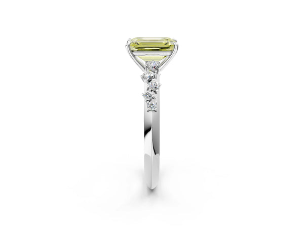 Platinum Fancy Yellow Emerald Cut Diamond Cluster Side Stone Solitaire Ring with Prong Setting