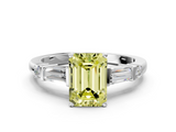 White gold Fancy Yellow Emerald  Cut Diamond Ring with Baguette Side Stones, Channel Set Band, and Four-Prong Setting_3
