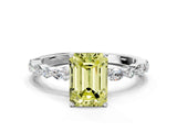 White gold Fancy Yellow Emerald Cut Diamond Ring with Marquise and Round  Side Stones and Four-Prong Setting_76