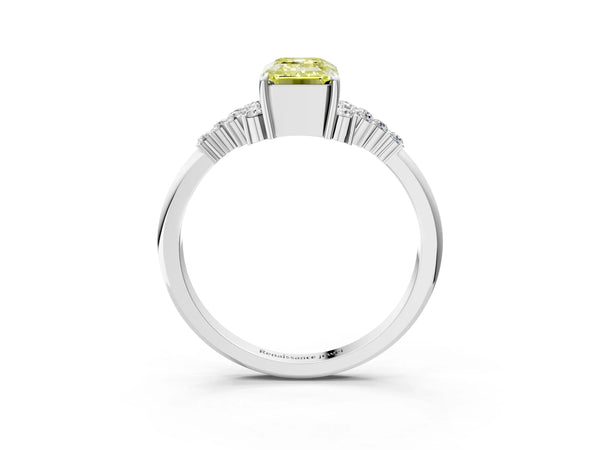 Platinum Fancy Yellow Emerald Cut Diamond Ring with Side Stones and Four-Prong Setting