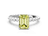 White gold Fancy Yellow Emerald Cut Diamond Solitaire Ring with Beaded Band and Prong Setting_362