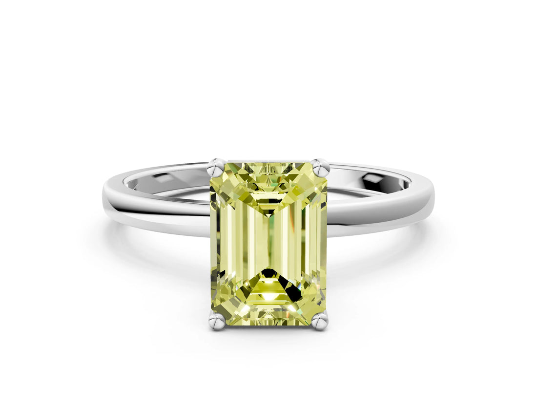 White gold Fancy Yellow Emerald Cut Diamond Solitaire Ring with Classic Band and Four-Prong Setting