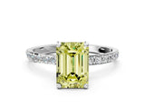 White gold Fancy Yellow Emerald Cut Diamond Solitaire Ring with Round  Pavé Band and Prong Setting_192