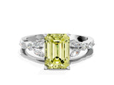 White gold Fancy Yellow Emerald Cut Diamond Solitaire Ring with Side Stones and Four-Prong Setting_258