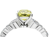 White gold Fancy Yellow Emerald Cut Diamond Solitaire Ring with Side Stones and Four-Prong Setting_261