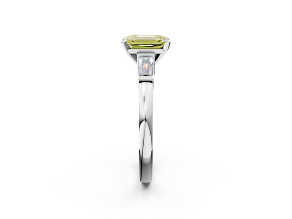 White gold Fancy Yellow Emerald  Cut Diamond Solitaire Ring with Tapered Baguette Accents and Four-Prong Setting