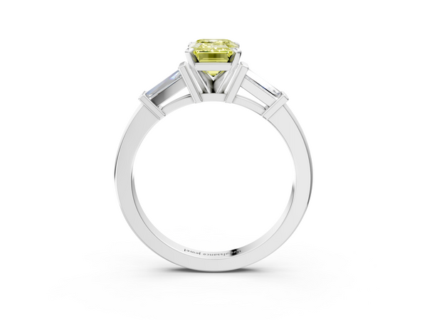 White gold Fancy Yellow Emerald  Cut Diamond Solitaire Ring with Tapered Baguette Accents and Four-Prong Setting