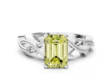 White gold Fancy Yellow Emerald Cut Diamond Solitaire Ring with Twisted Band and Prong Setting_278