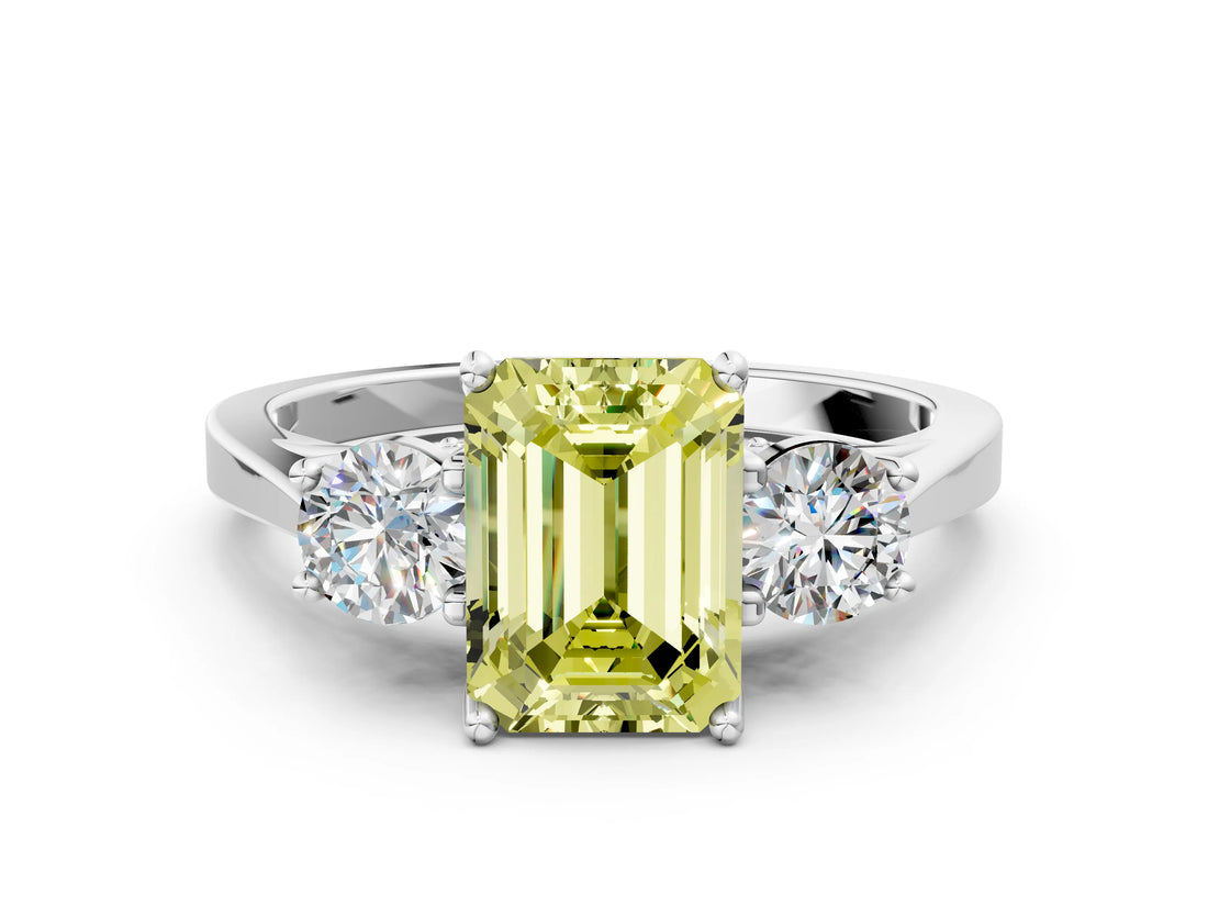 White gold Fancy Yellow Emerald Cut Diamond Three-Stone Engagement Ring with Prong Setting and Pavé Band