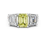 White gold Fancy Yellow Emerald Cut Diamond Three-Stone Ring with Channel Set Band and Four-Prong Setting_93