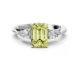White gold Fancy Yellow Emerald Cut Diamond Three-Stone Ring with Pear  Side Stones and Prong Setting_126