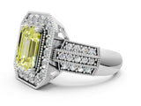 White gold Fancy Yellow Emerald Cut Halo Diamond Engagement Ring with Pave Split Shank and Four-Prong Setting