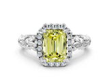 White gold Fancy Yellow Emerald Cut Halo Diamond Solitaire with Filigree Band and Four-Prong Setting