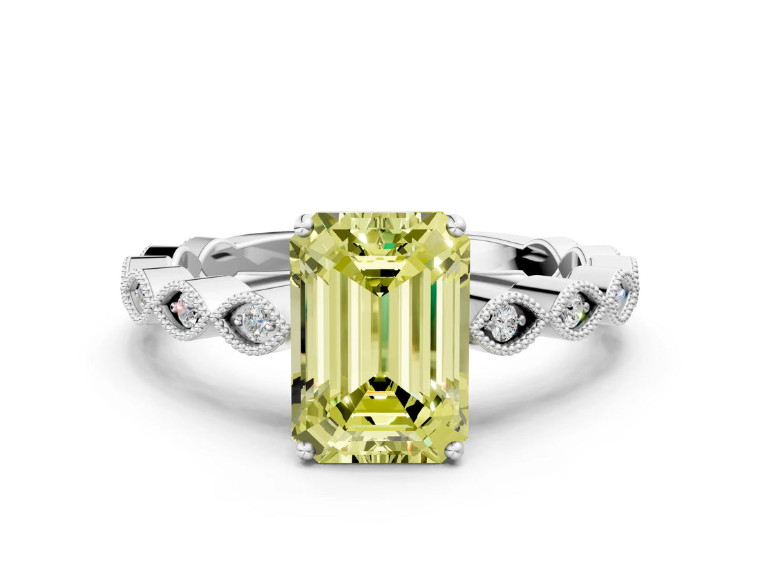 White gold Fancy Yellow Emerald Cut Solitaire Diamond Ring with Infinity Twist Band and Four-Prong Setting