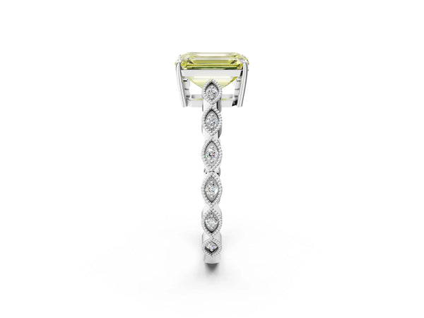 White gold Fancy Yellow Emerald Cut Solitaire Diamond Ring with Infinity Twist Band and Four-Prong Setting