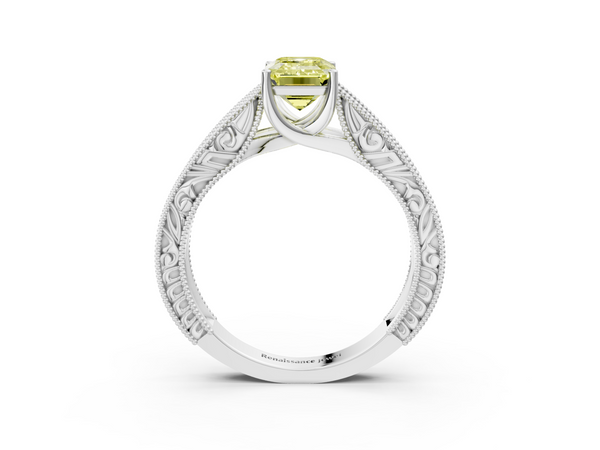 White gold Fancy Yellow Emerald Cut Diamond Solitaire Ring with Engraved Band and Four-Prong Setting
