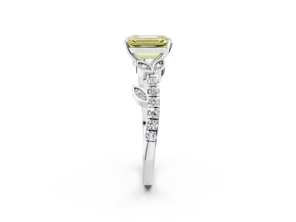 White gold Fancy Yellow Emerald Cut Solitaire Leaf-Inspired Diamond Ring with Pavé Band and Four-Prong Setting