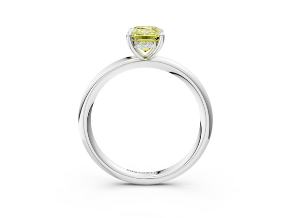 White gold Fancy Yellow Emerald Cut Diamond Solitaire Ring with Thin Band and Four-Prong Setting