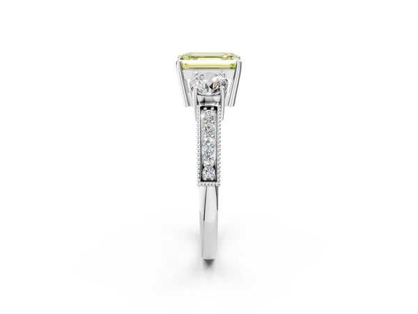 White gold Fancy Yellow Emerald Cut Three-Stone Diamond Ring with Pavé Band and Four-Prong Setting