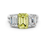 White gold Fancy Yellow Emerald Cut Three-Stone Diamond Ring with Prong Setting on a Classic Band_12