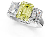 White gold Fancy Yellow Emerald Cut Three-Stone Diamond Ring with Prong Setting on a Classic Band_13
