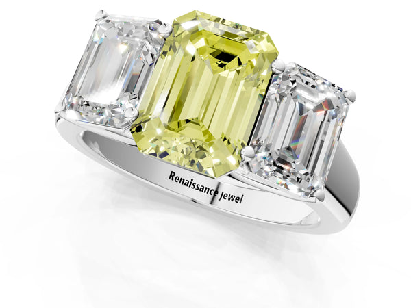 White gold Fancy Yellow Emerald Cut Three-Stone Diamond Ring with Prong Setting on a Classic Band