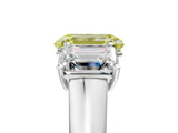 White gold Fancy Yellow Emerald Cut Three-Stone Diamond Ring with Prong Setting on a Classic Band_23