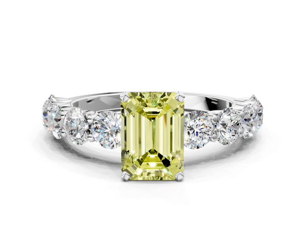 White gold Fancy Yellow Emerald Cut Diamond Prong Setting with Side Stones on a Pave Band