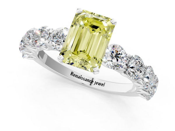 White gold Fancy Yellow Emerald Cut Diamond Prong Setting with Side Stones on a Pave Band