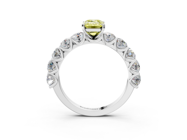 White gold Fancy Yellow Emerald Cut Diamond Prong Setting with Side Stones on a Pave Band