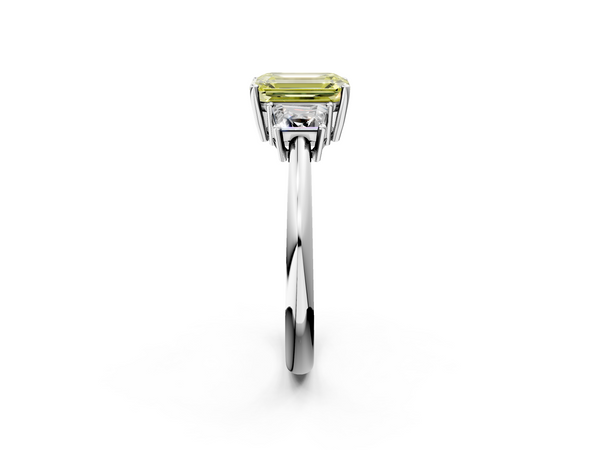 18K White Gold 5.03 Carat Yellow VVS2 Emerald Diamond Three-Stone Ring with Trapezoid Side Stones and Prong Setting