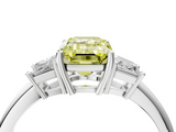 18K White Gold 5.03 Carat Yellow VVS2 Emerald Diamond Three-Stone Ring with Trapezoid Side Stones and Prong Setting